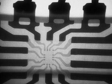 Same device as previous image, no wire bonds detected internally.